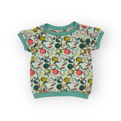 T-shirt en jersey bio pour les bébés et les enfants avec des agrumes colorés sur fond vert menthe