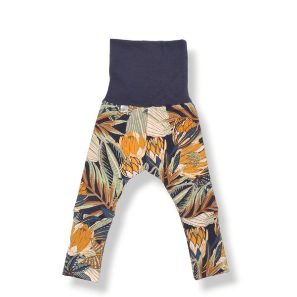 legging évolutif pour bébé et enfant en french terry bleu nuit avec des motifs végétaux