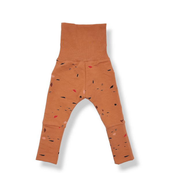 legging évolutif pour bébé et enfant avec des motifs colorés sur fond brun d'automne