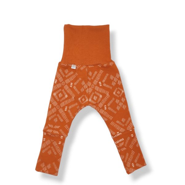 legging évolutif pour bébé et enfant en french terry cuivré avec des motifs géométriques