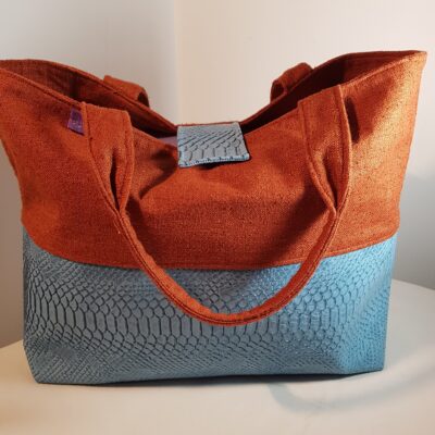 Sac à main bicolore croco bleu