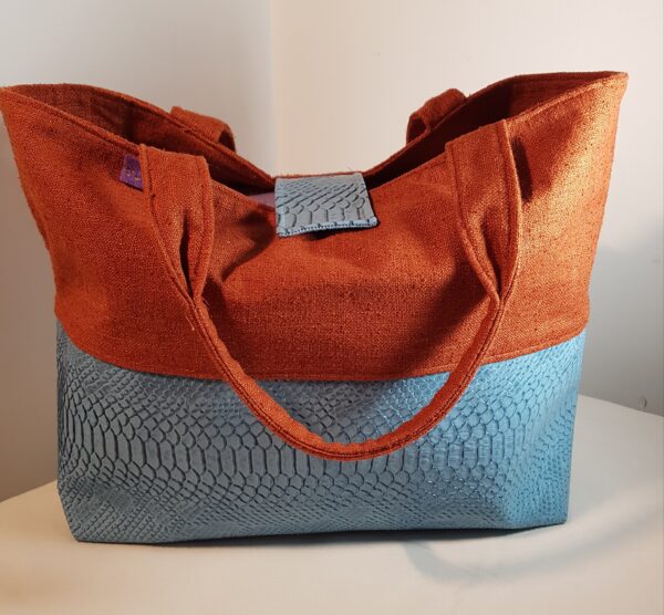 Sac à main bicolore croco bleu