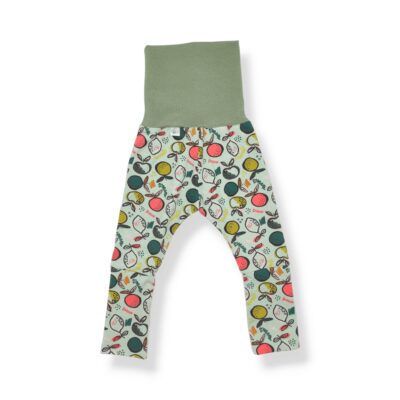 legging évolutif pour bébé et enfant en jersey bio avec des agrumes colorés sur fond vert menthe