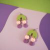 Boucles d'oreilles forme arc-en-ciel arche vert et ronds rose pale et violet