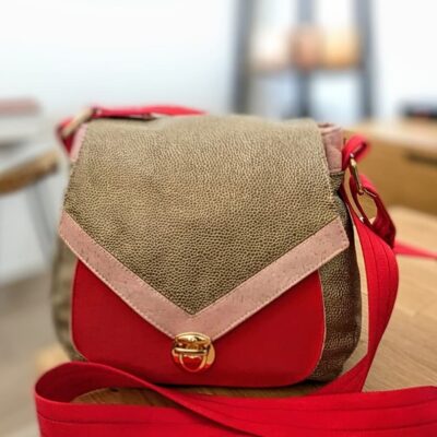 Sac bandoulière rouge et doré avec rabat fermoir cartable