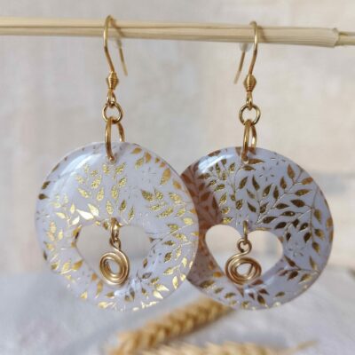 Boucles d'oreilles rondes motifs feuillage or