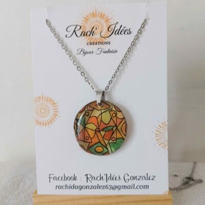 Pendentif rond effets verre motifs abstraits