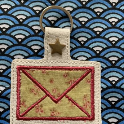 Porte clés courrier
