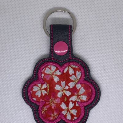 Porte clés fleur appliquée