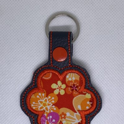 Porte clés fleur appliquée