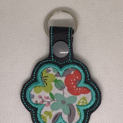 Porte clés fleur appliquée