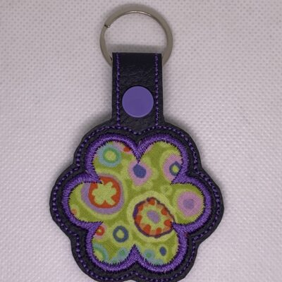 Porte clés fleur appliquée