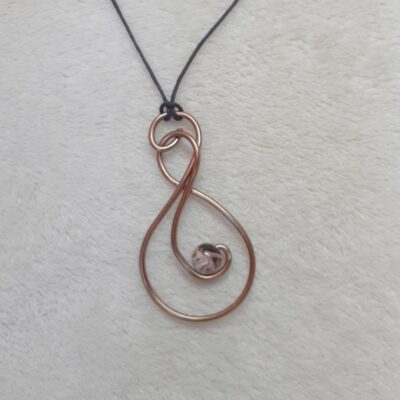 petit pendentif brun