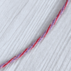 Détail du collier kumihimo rouge et violet