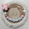 attache tétine clip fleur rose