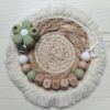 attache tétine clip fleur vert