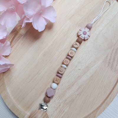 attache tetine fleur