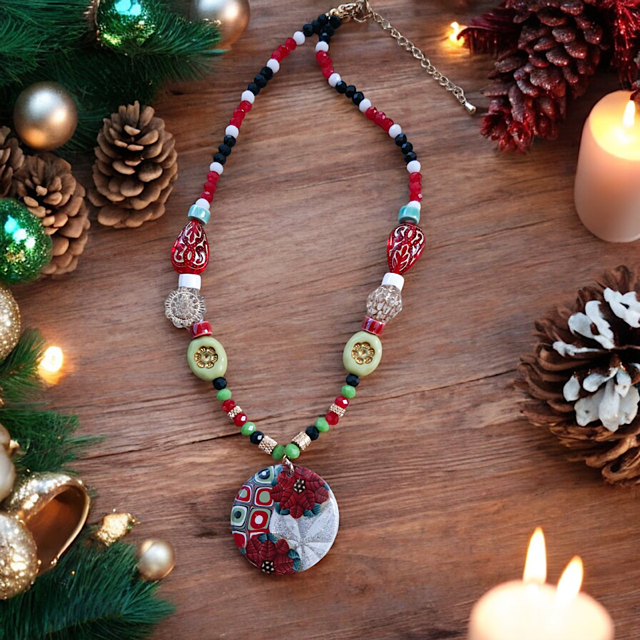 Collier festif poinsettia en pâte polymère isycrea bijoux