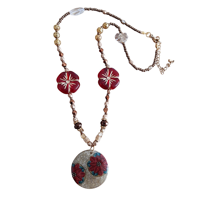 Collier festif poinsettia en pâte polymère isycrea bijoux