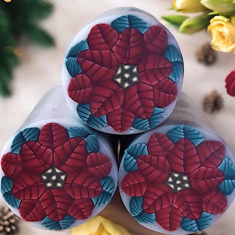 Motif noël festif poinsettia en pâte polymère isycrea