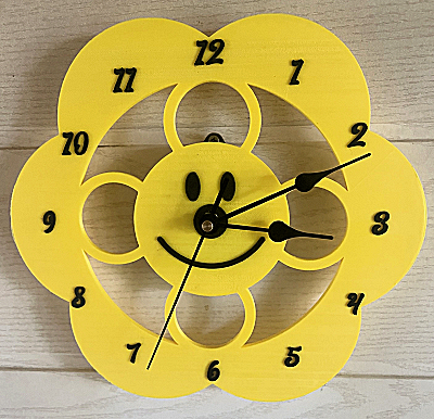 Pendule murale Fleur sourire