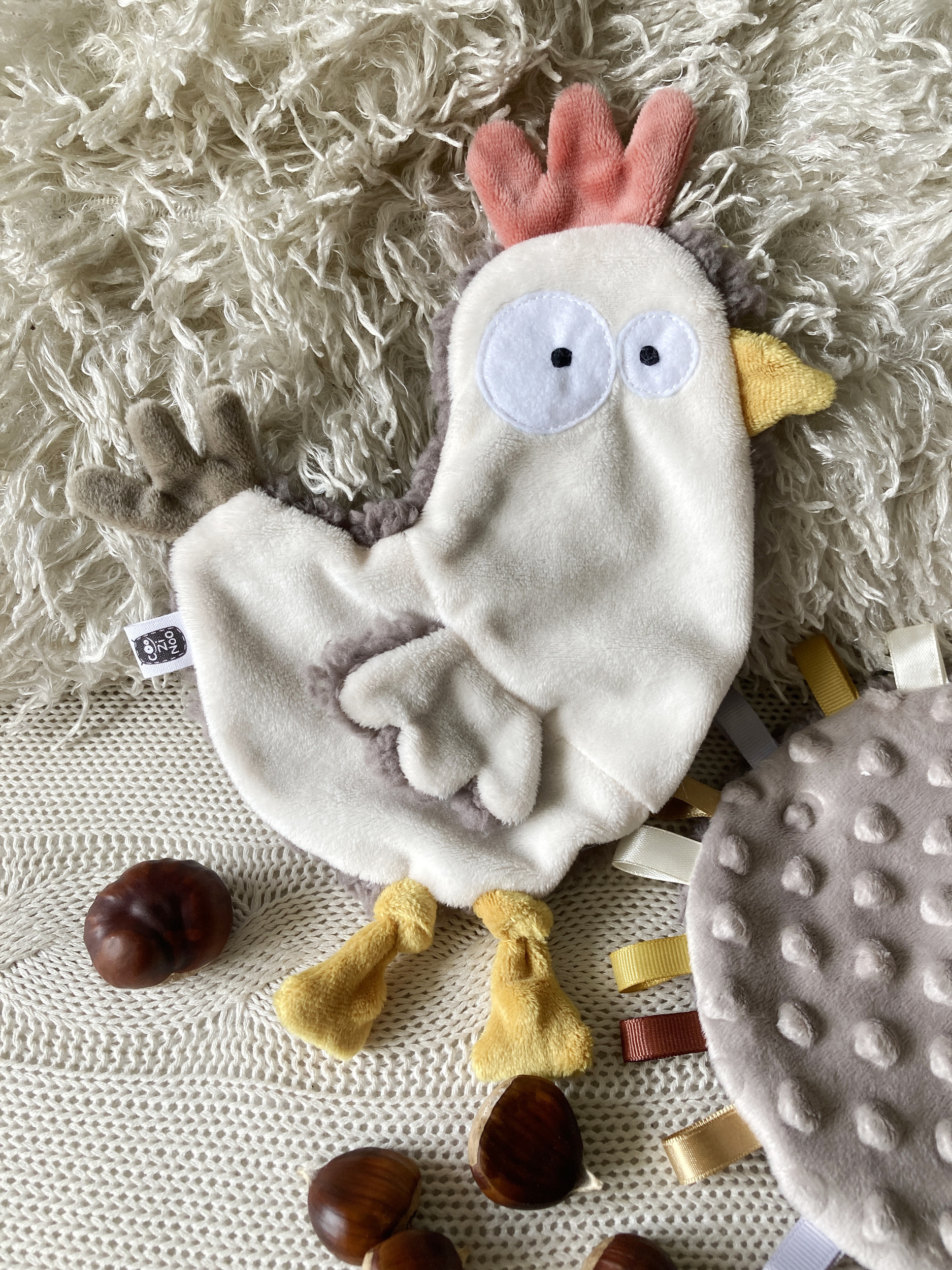 doudou poule plate fourrure douillette
