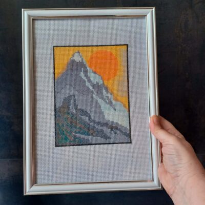 Broderie "Coucher de soleil au sommet"