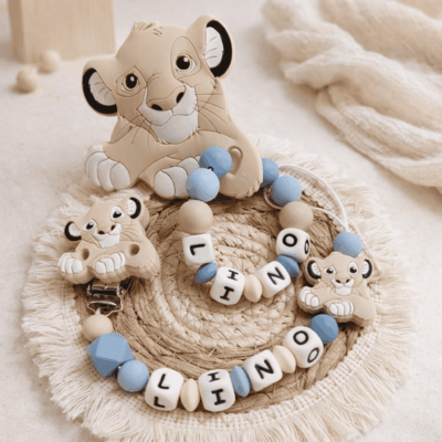 ensemble dentition anneau = attache tétine lionceau