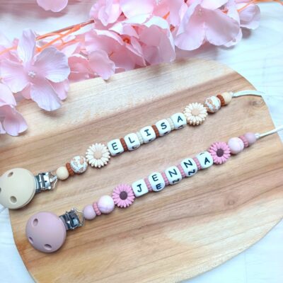 attache tétine marguerites