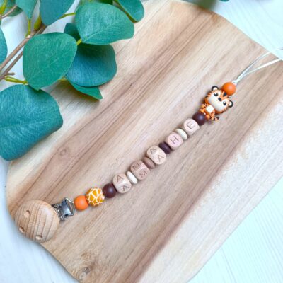 attache tétine tigre