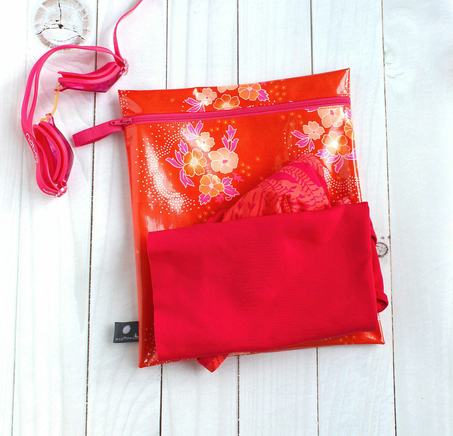 pochette enduite maillot mouille motif fleurs