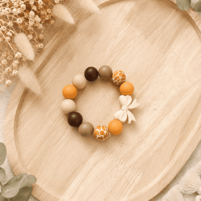 anneau dentition noeud orange marron beige