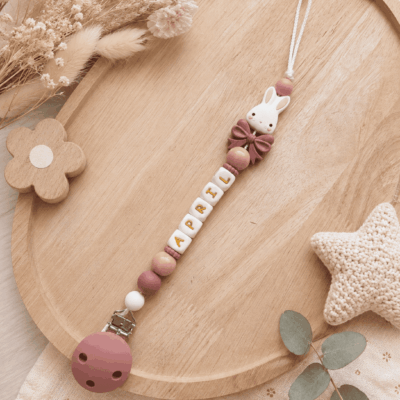 attache tetine lapin noeud or