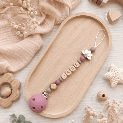 attache tétine fleur lotus or rose