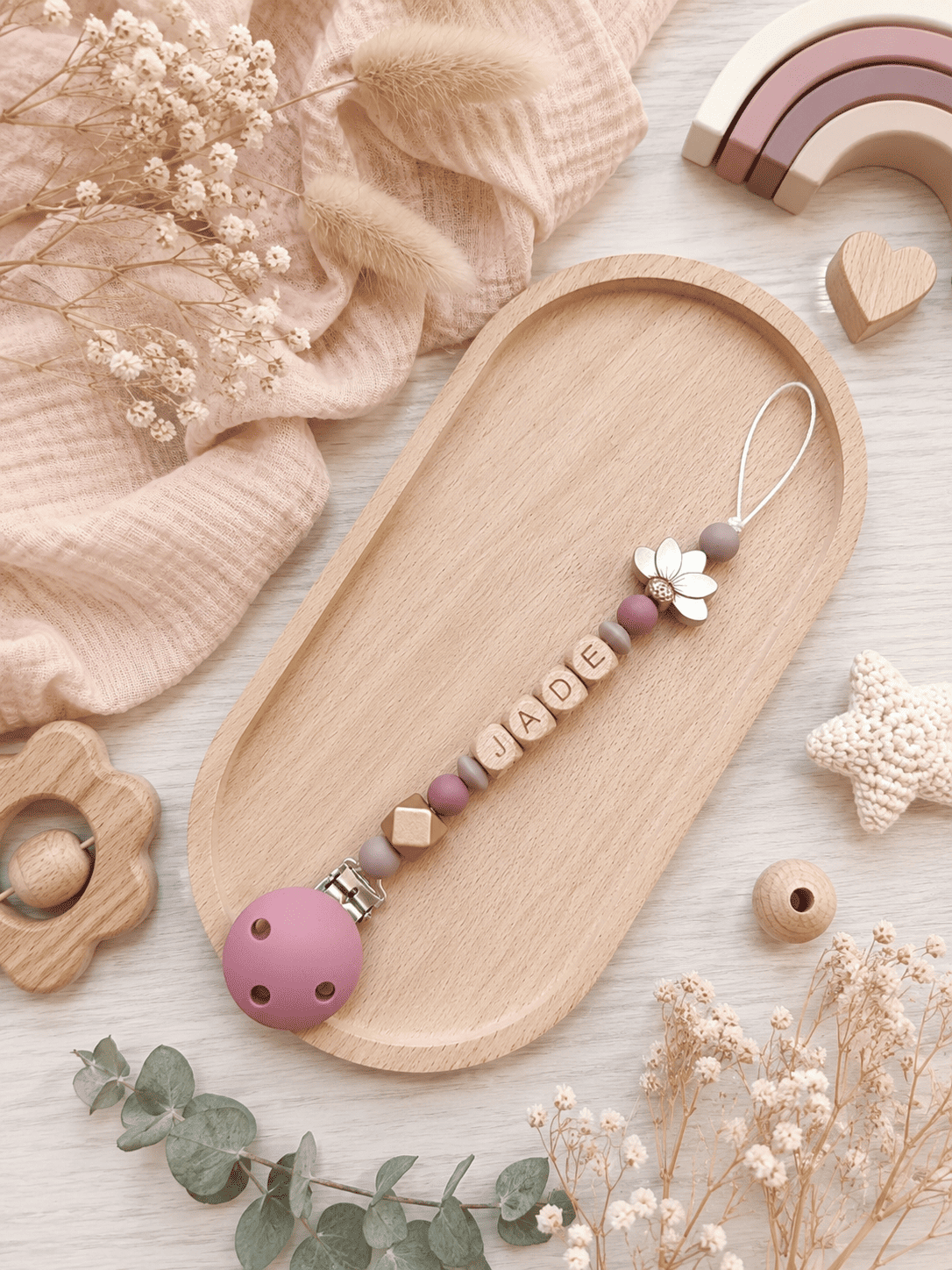 attache tétine fleur lotus or rose