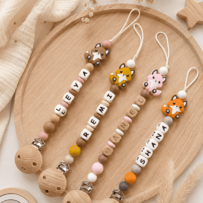 attache tétine renards