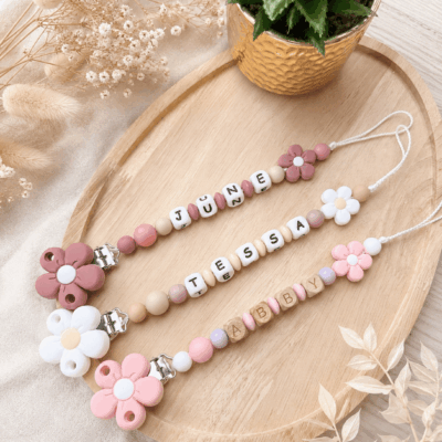 attache tétine fleur