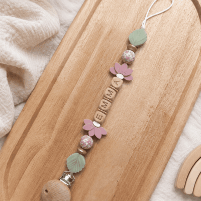 attache tétine fleurs roses or