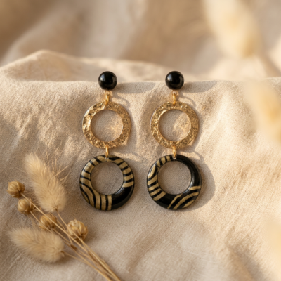 Boucles d'oreilles doubles cercles fait main Nāca — noir & doré