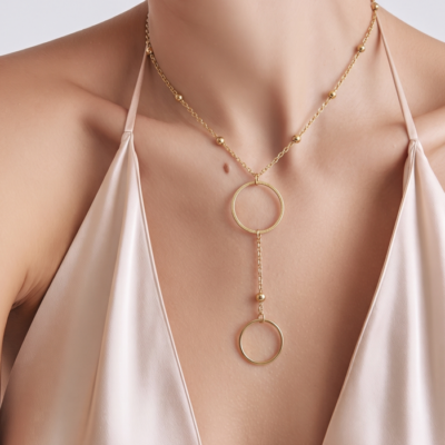 Collier avec deux anneaux et chaine perlée minimaliste, en acier inoxydable dorée